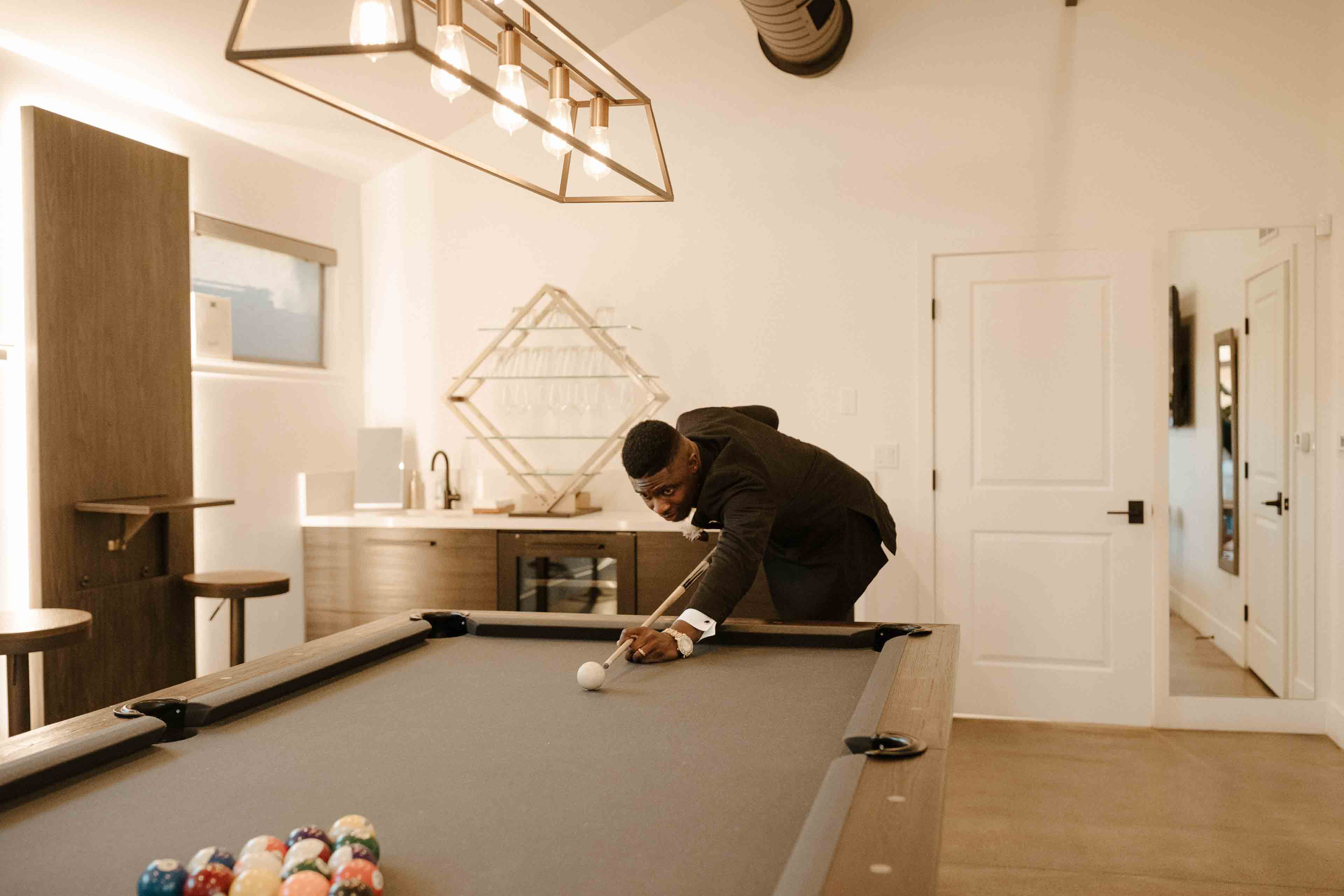 man playing pool in the billard room