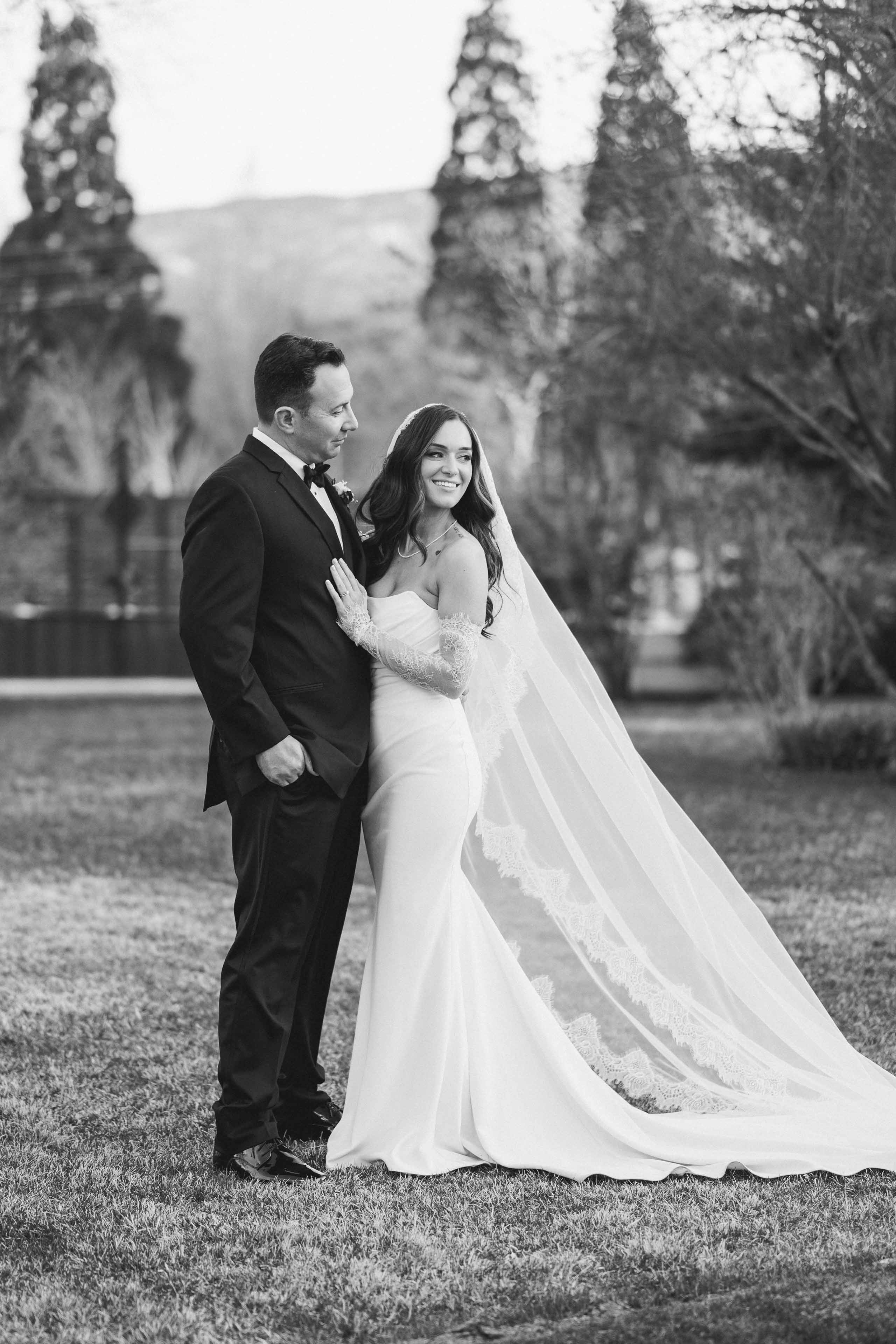 Emma and Andres Real Couple Posing and smiling Wedding at The Elm Estate
