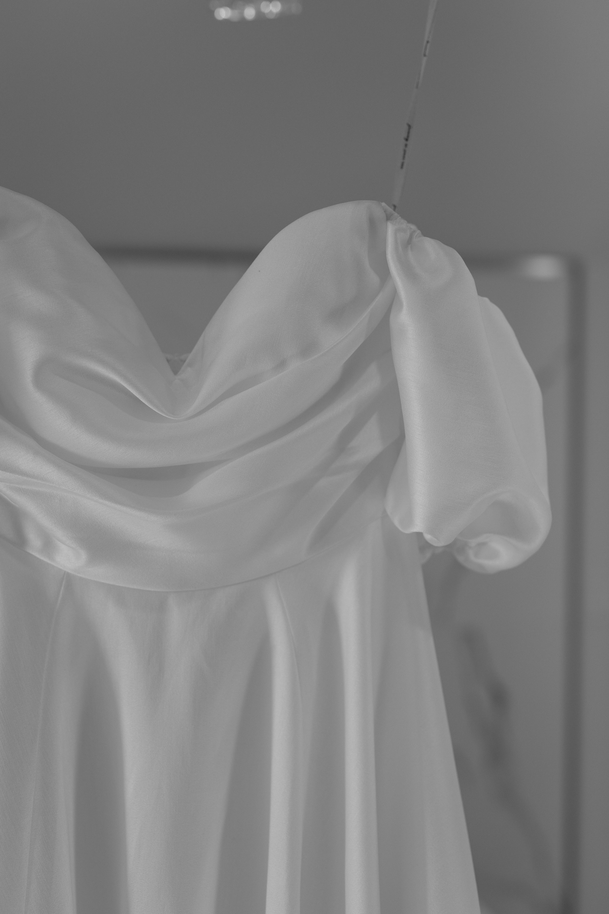 an up close view of the sleeve of a wedding dress